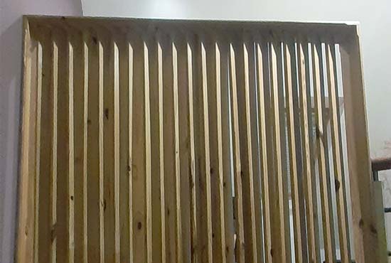 Séparation de pièce en bois